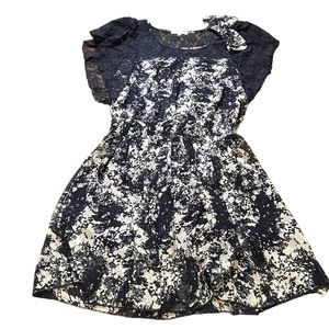 Cecico navy mini dress with lace on chest area and a bow on shoulder size large